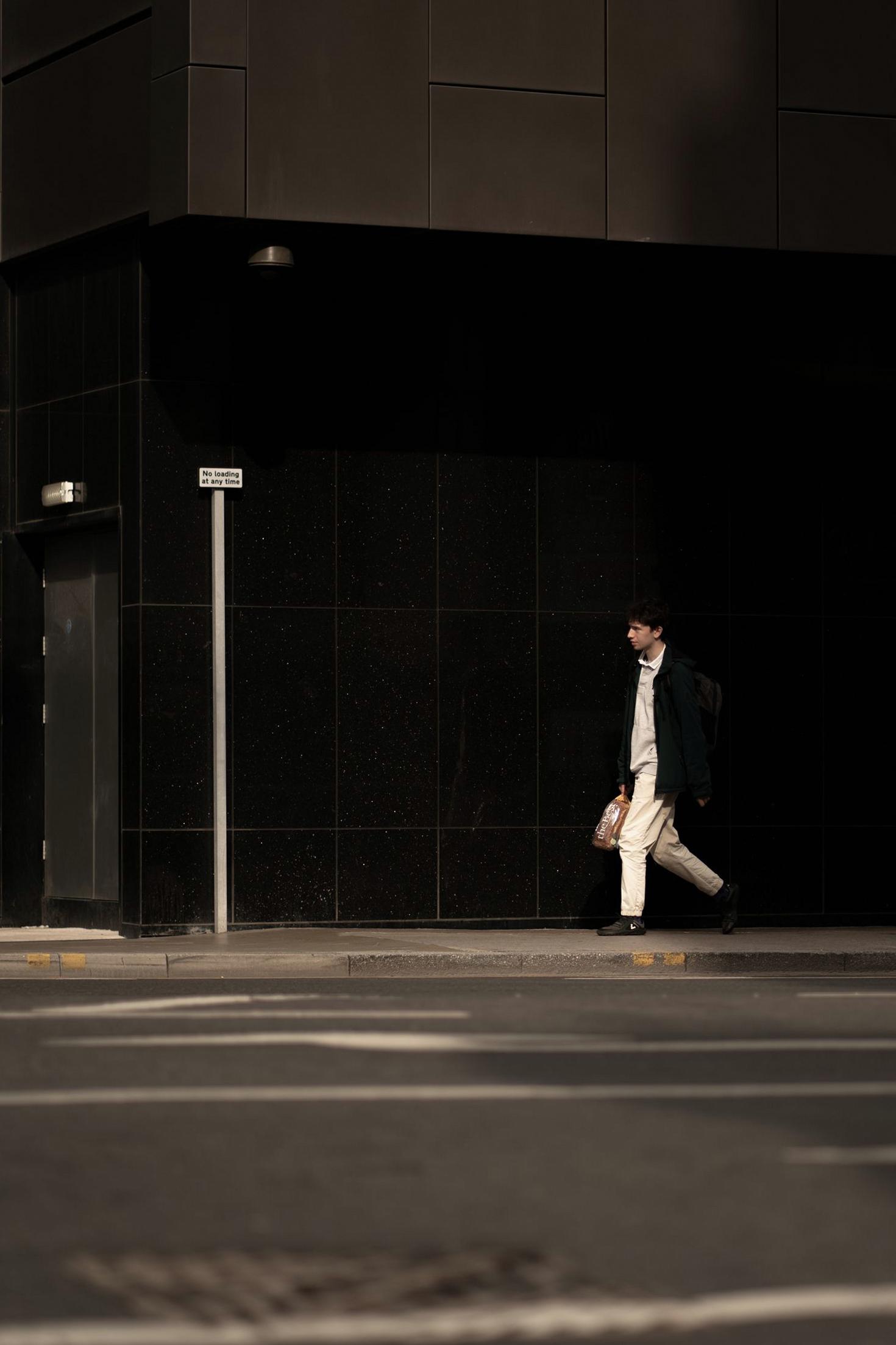 Man in black coat