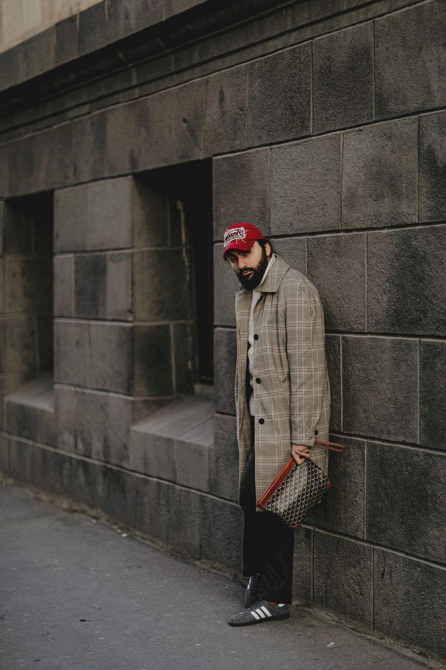 Man in plaid coat