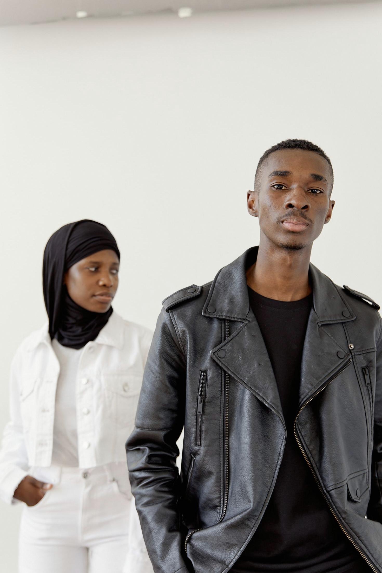 Models in contemporary monochrome outfits
